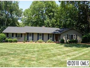 1156 Andover Road Charlotte, NC 28211 - Photo 1 of 8 a front view of a house with a yard