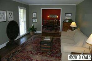 1156 Andover Road Charlotte, NC 28211 - Photo 7 of 8 a living room with furniture and a fireplace