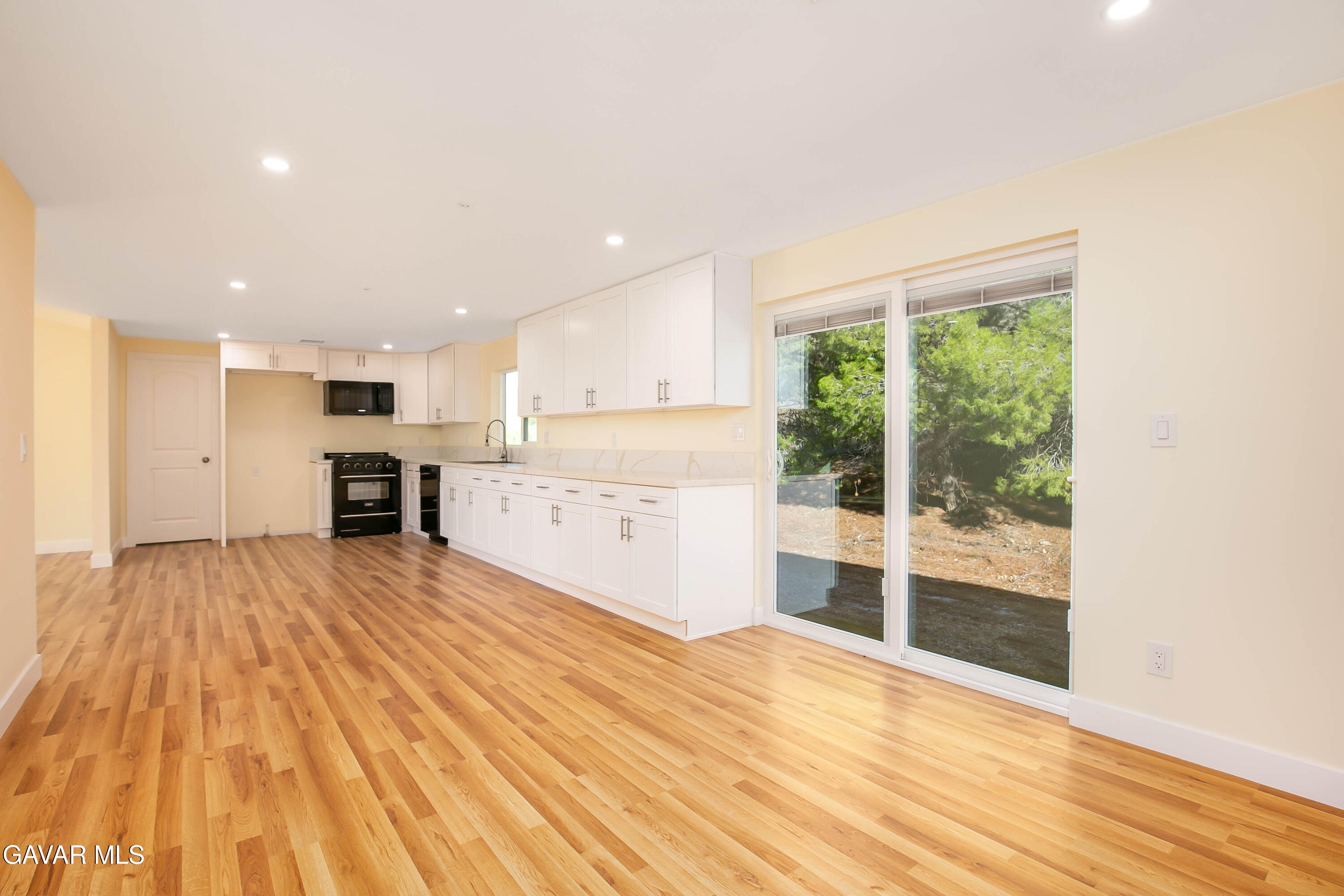 32010 Quirk Road Acton, CA 93550 - Photo 12 of 38 a view of a kitchen with wooden floor and a kitchen
