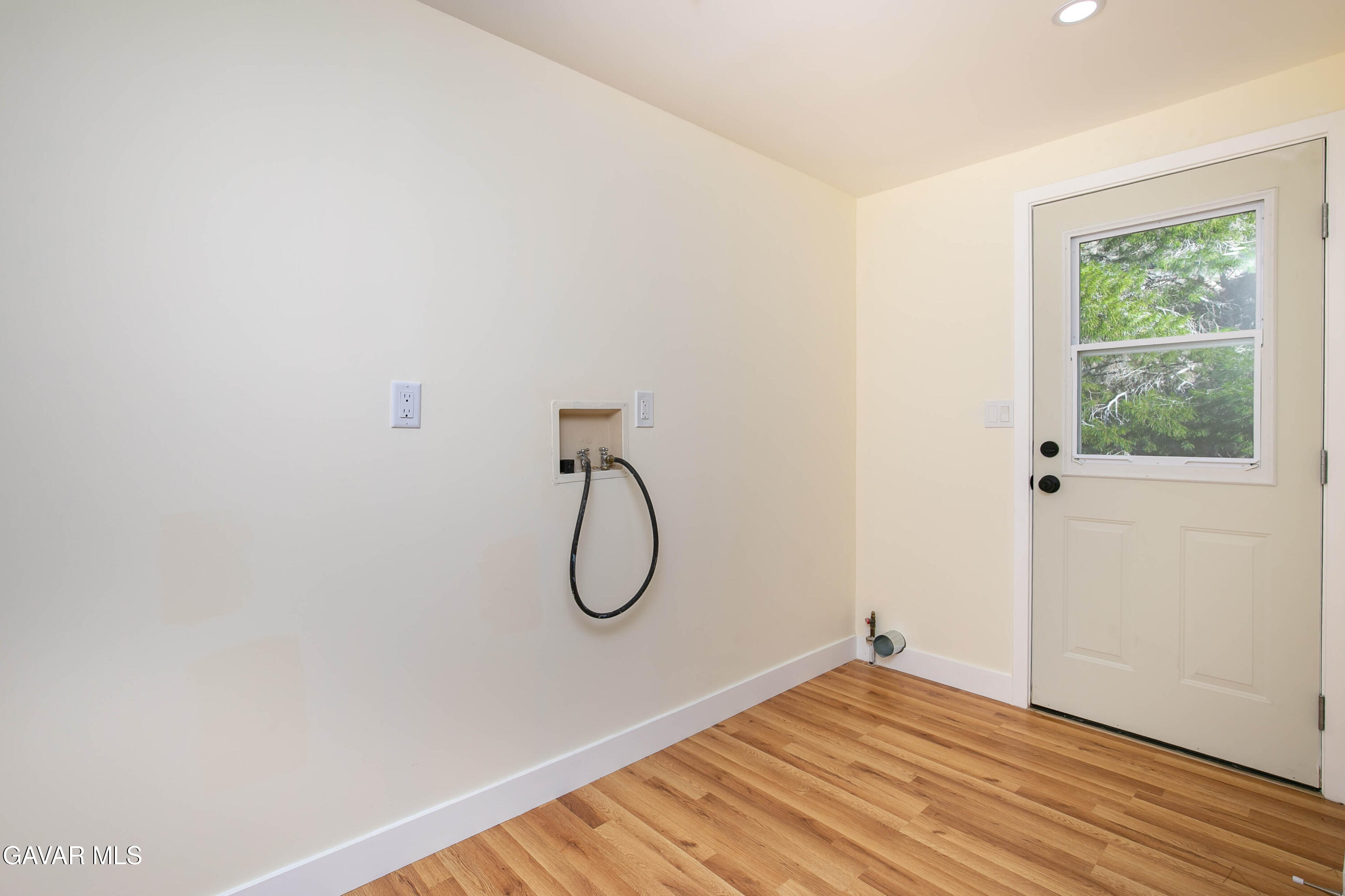 32010 Quirk Road Acton, CA 93550 - Photo 15 of 38 a view of a room with wooden floor and windows