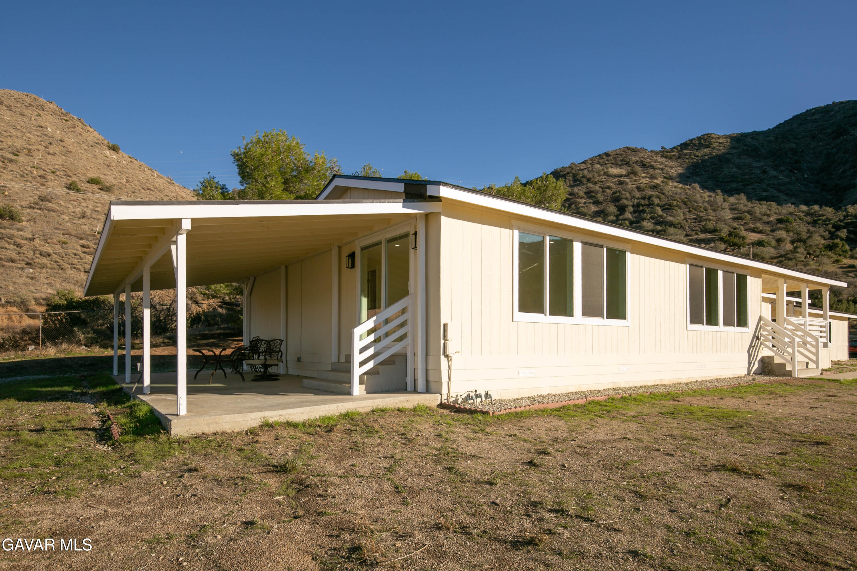 32010 Quirk Road Acton, CA 93550 - Photo 2 of 38 a view of a house with a backyard