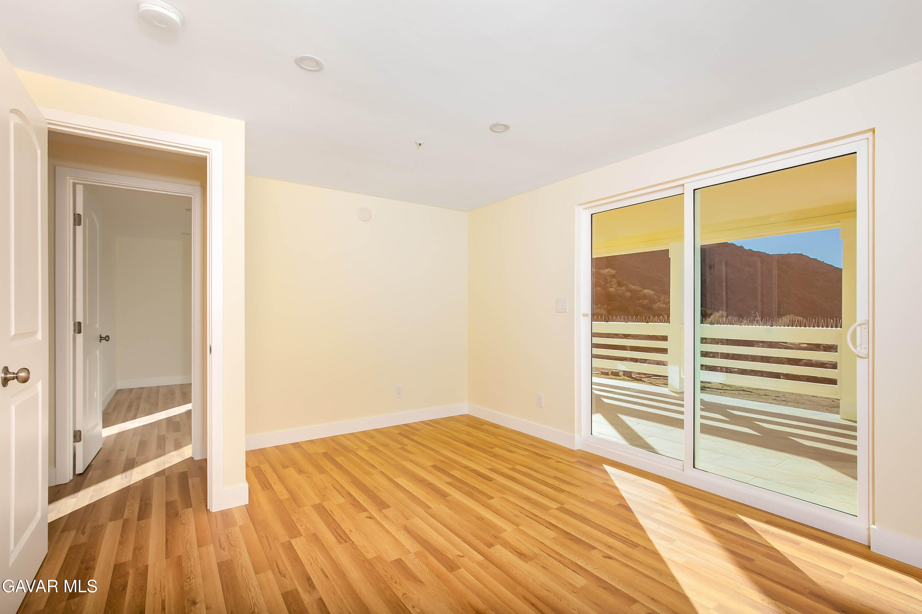 32010 Quirk Road Acton, CA 93550 - Photo 22 of 38 a view of wooden floor and windows in a room