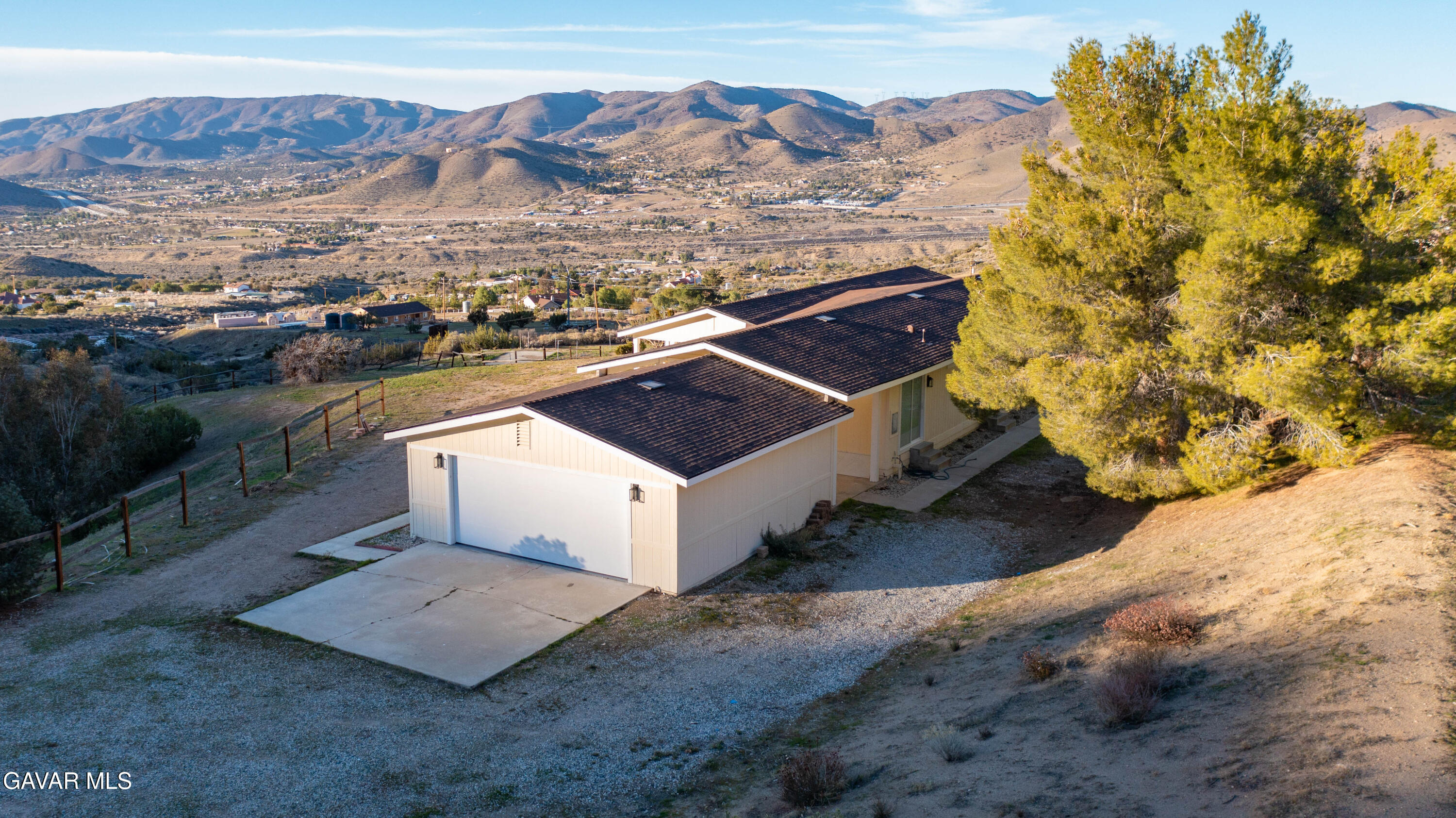 32010 Quirk Road Acton, CA 93550 - Photo 28 of 38 a view of a house with a yard and mountain view in back