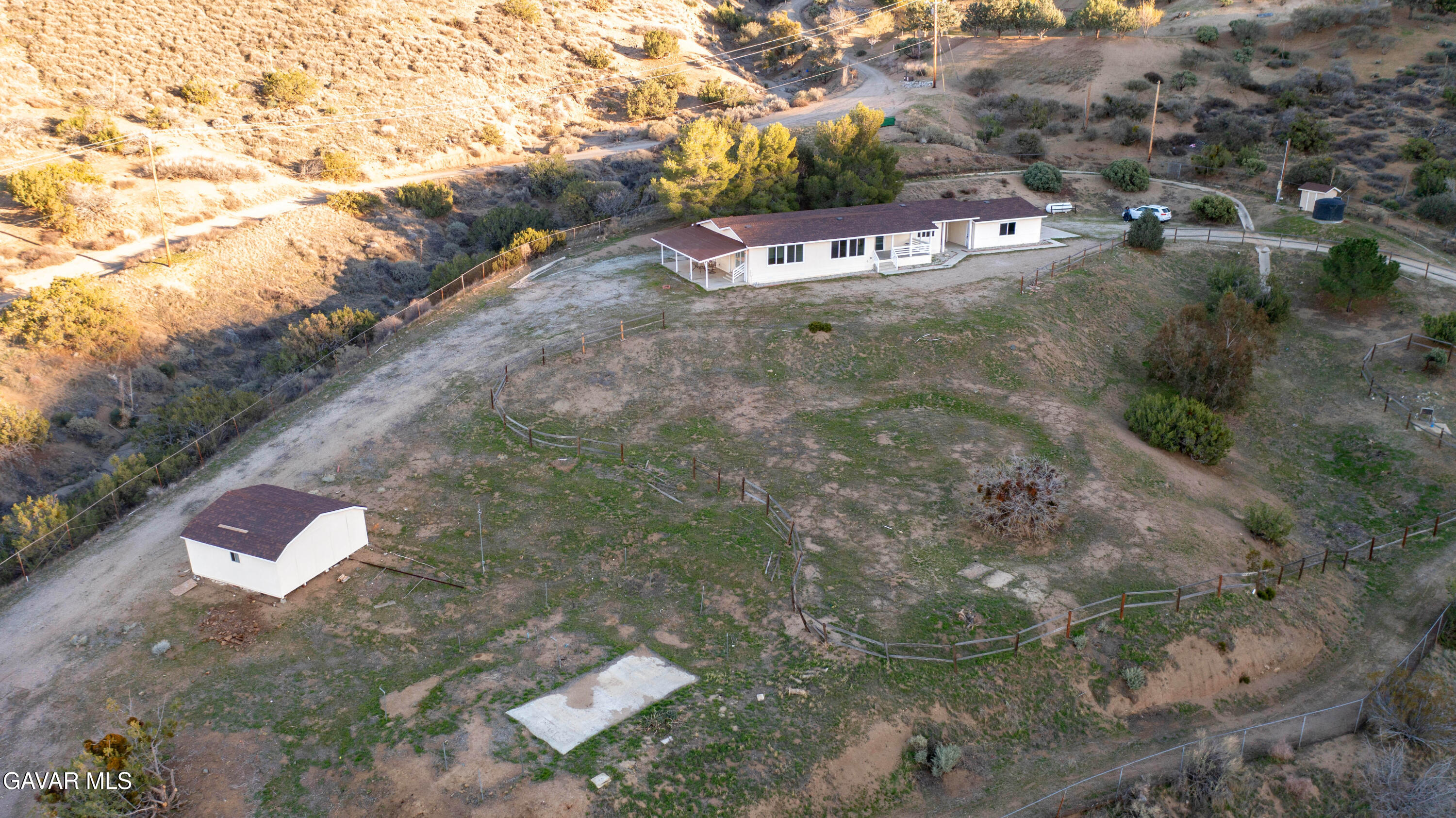 32010 Quirk Road Acton, CA 93550 - Photo 35 of 38 a view of a dry yard with wooden fence