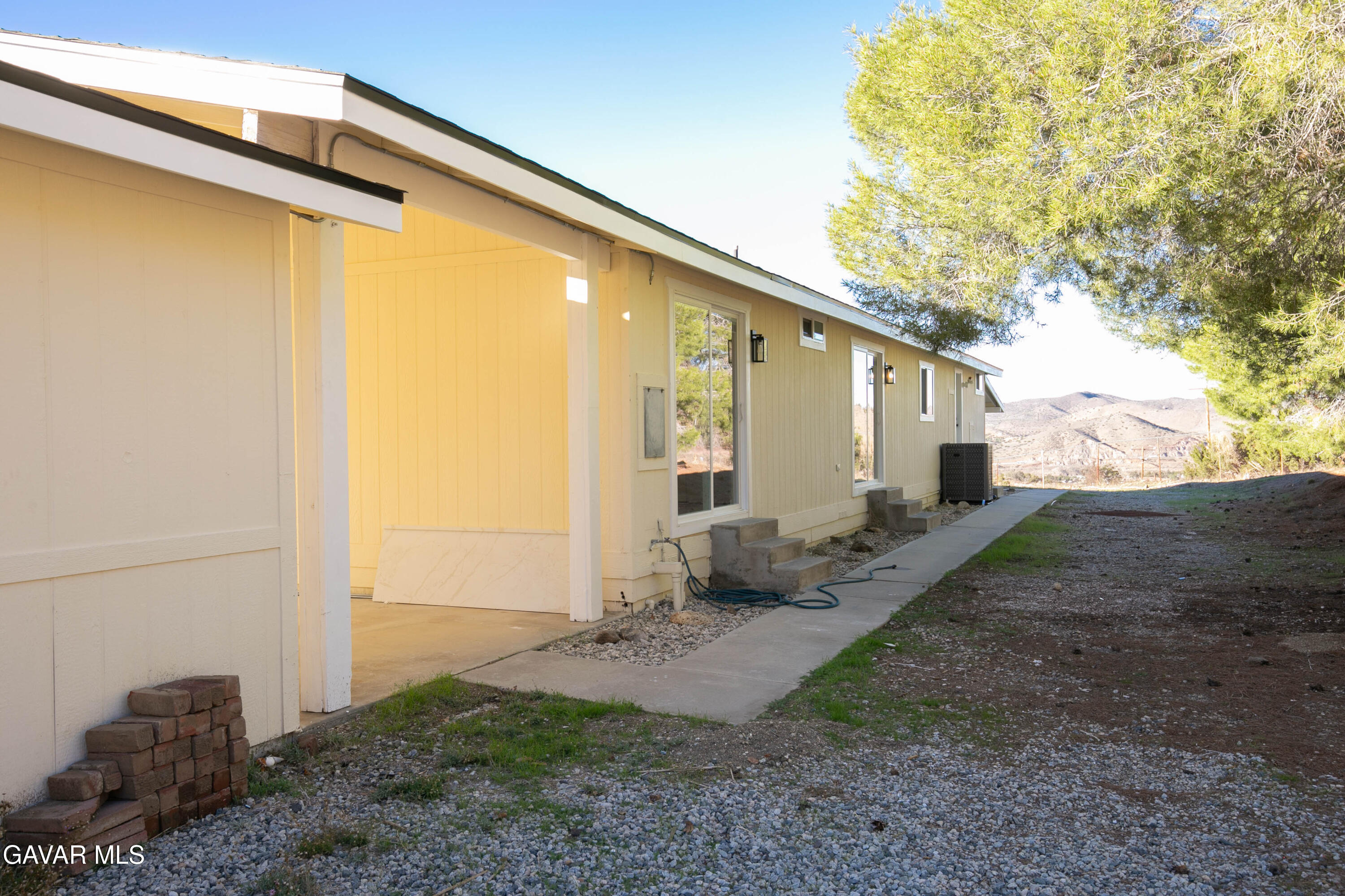 32010 Quirk Road Acton, CA 93550 - Photo 4 of 38 a backyard of a house with seating space