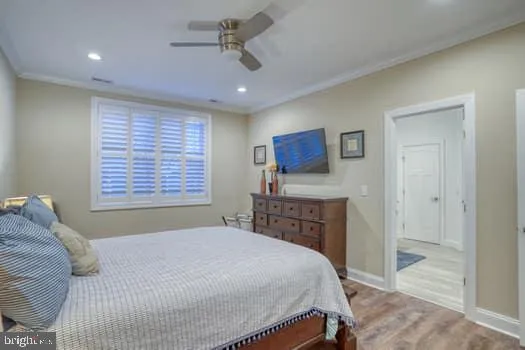 a kitchen with a stove and white cabinets