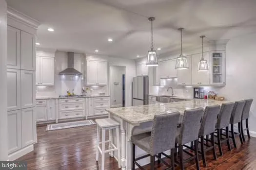 a bedroom with a large bed and a tv