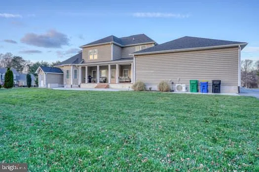 a kitchen with a sink stainless steel appliances and cabinets