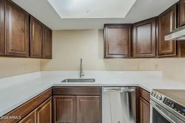 a kitchen with a stove and a microwave