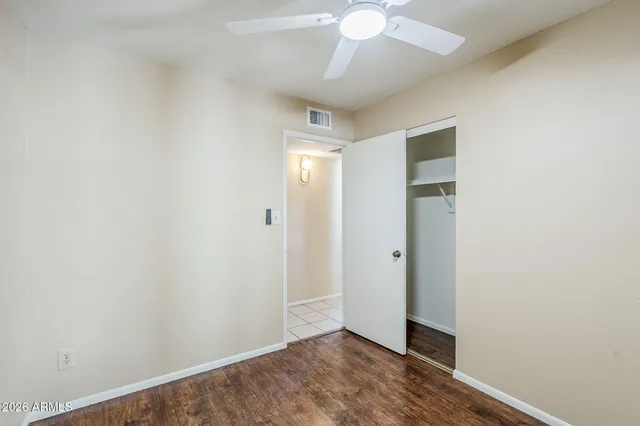 a bathroom with a sink toilet and a mirror