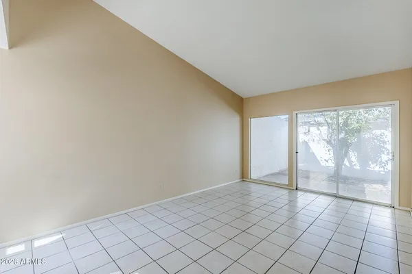 a view of an empty room and window