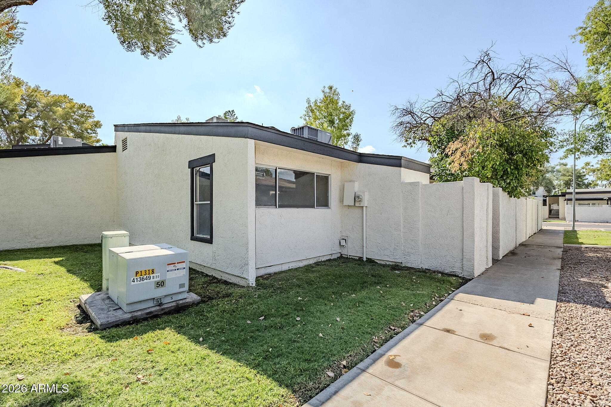 1051 South Dobson Road, Unit 128 Mesa, AZ 85202 - Photo 27 of 30 a view of a back yard of the house