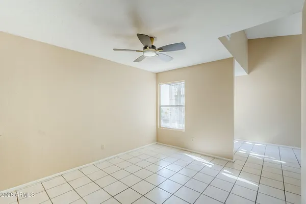 a kitchen with a sink and a refrigerator