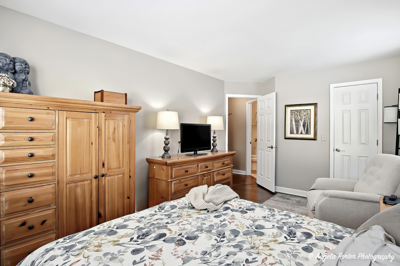 1516 Camden Court, Unit A1 Wheeling, IL 60090 - Photo 11 of 25 a bedroom with a bed and a television