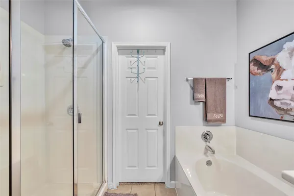 a bathroom with a sink double vanity and a mirror