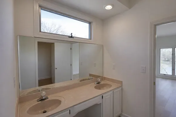 a utility room with a window dryer and washer