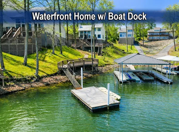 an aerial view of a house swimming pool patio and outdoor seating