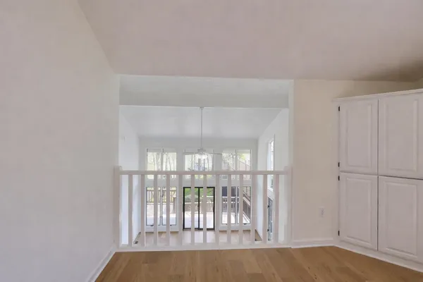 an empty room with a view of a bathroom