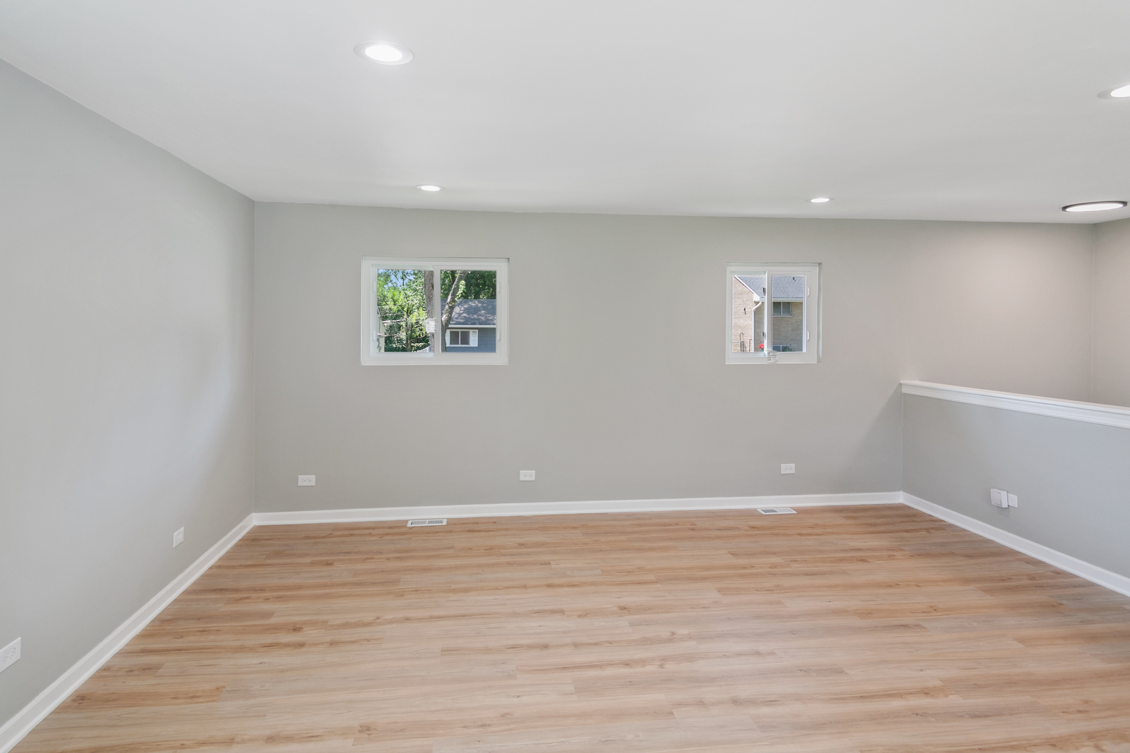 118 Windsor Lane Glendale Heights, IL 60139 - Photo 6 of 23 a view of room with window and wooden floor