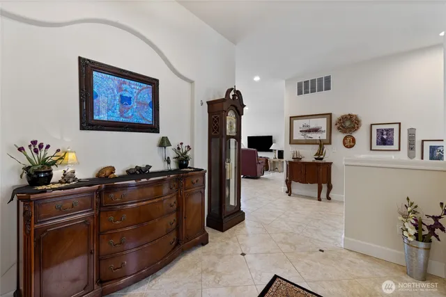 a bed room with furniture and cabinets