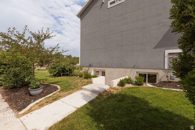 1654 South 730 West Provo, UT 84601 - Photo 33 of 33 Side exterior with stucco siding and a stone accent window surround