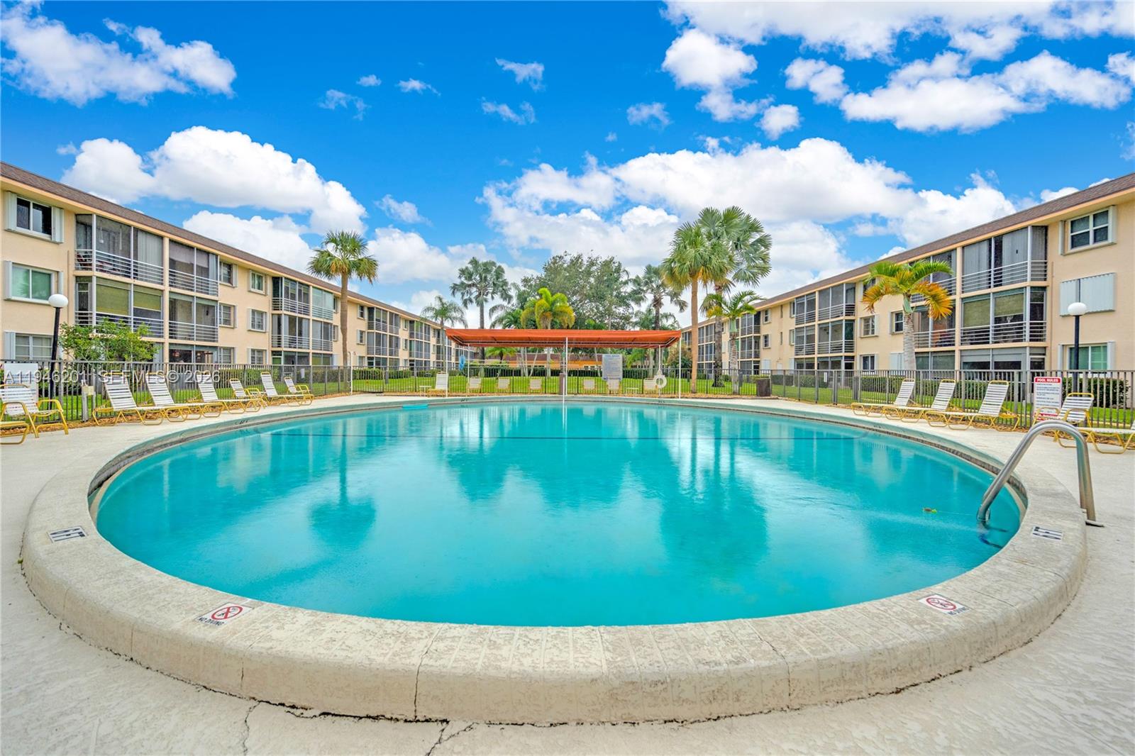 4502 North Federal Highway, Unit 167H Lighthouse Point, FL 33064 - Photo 22 of 31 a view of a swimming pool