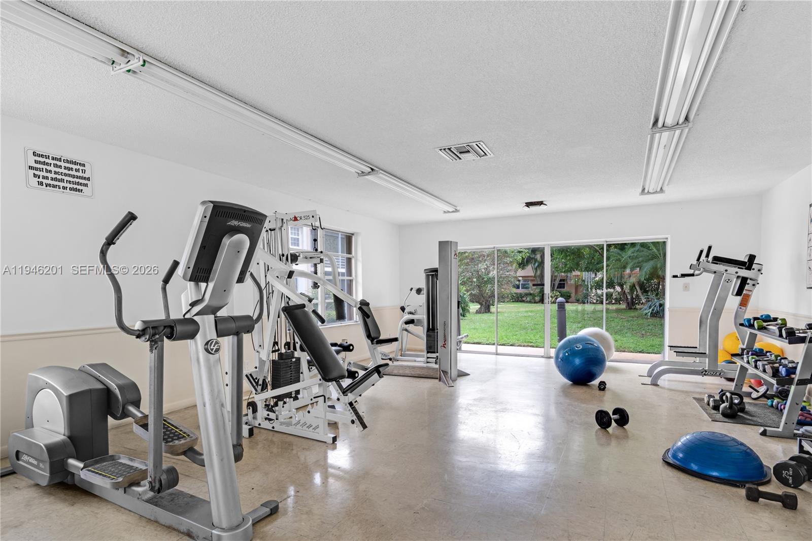 4502 North Federal Highway, Unit 167H Lighthouse Point, FL 33064 - Photo 23 of 31 a view of a room with gym equipment