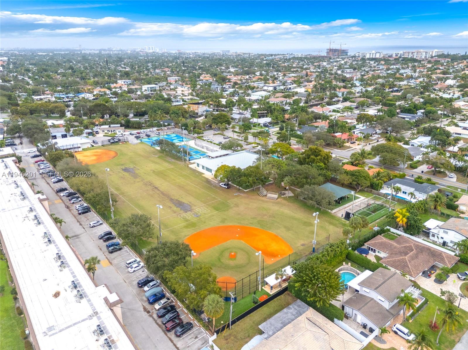 4502 North Federal Highway, Unit 167H Lighthouse Point, FL 33064 - Photo 31 of 31 an aerial view of residential houses with outdoor space