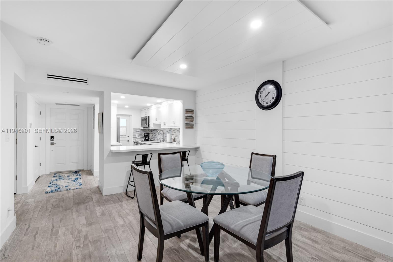 4502 North Federal Highway, Unit 167H Lighthouse Point, FL 33064 - Photo 6 of 31 a view of a dining room and livingroom