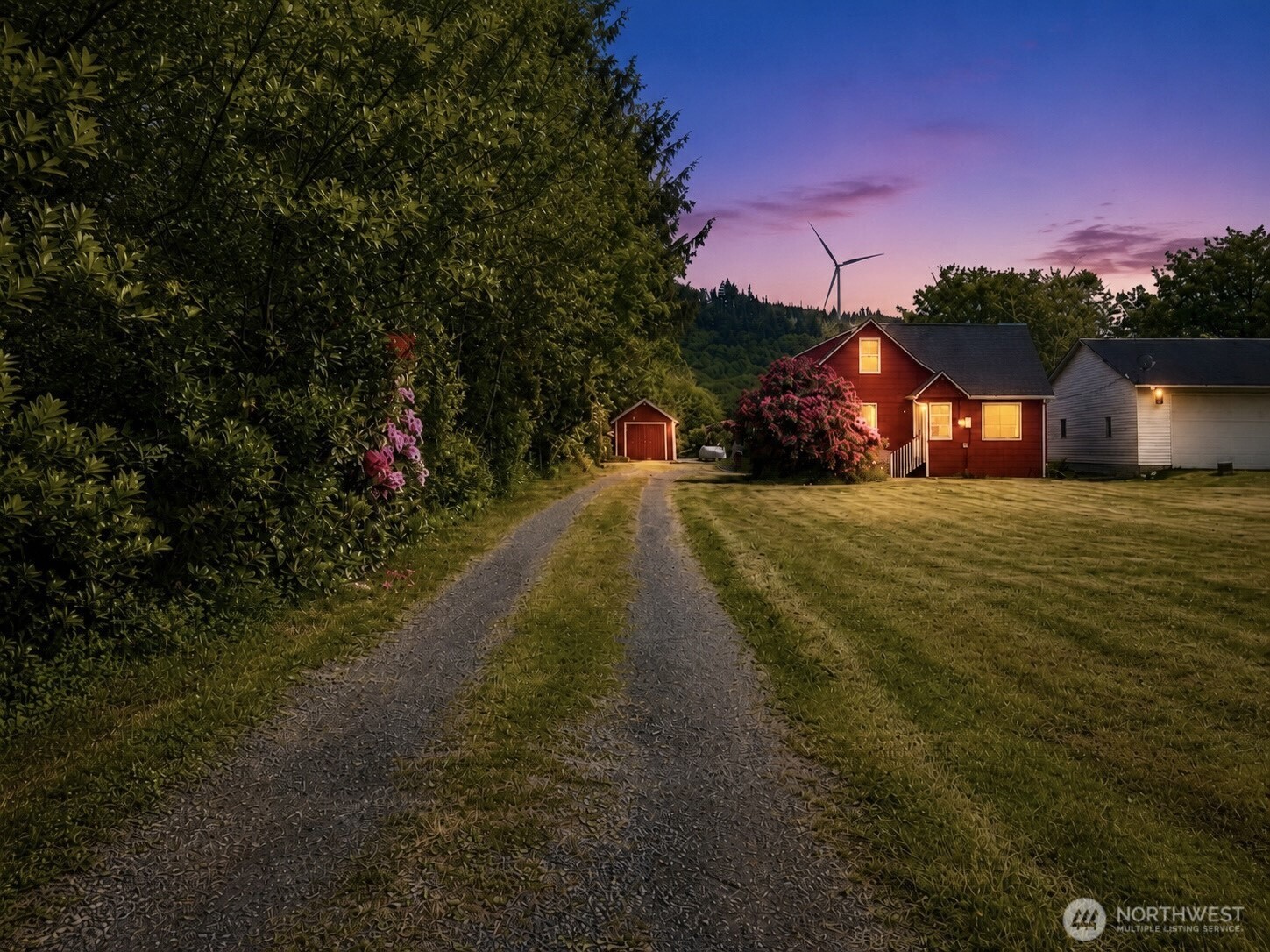 2154 Cranberry Road Grayland, WA 98547 - Photo 1 of 38 a view of a street with a building in the background