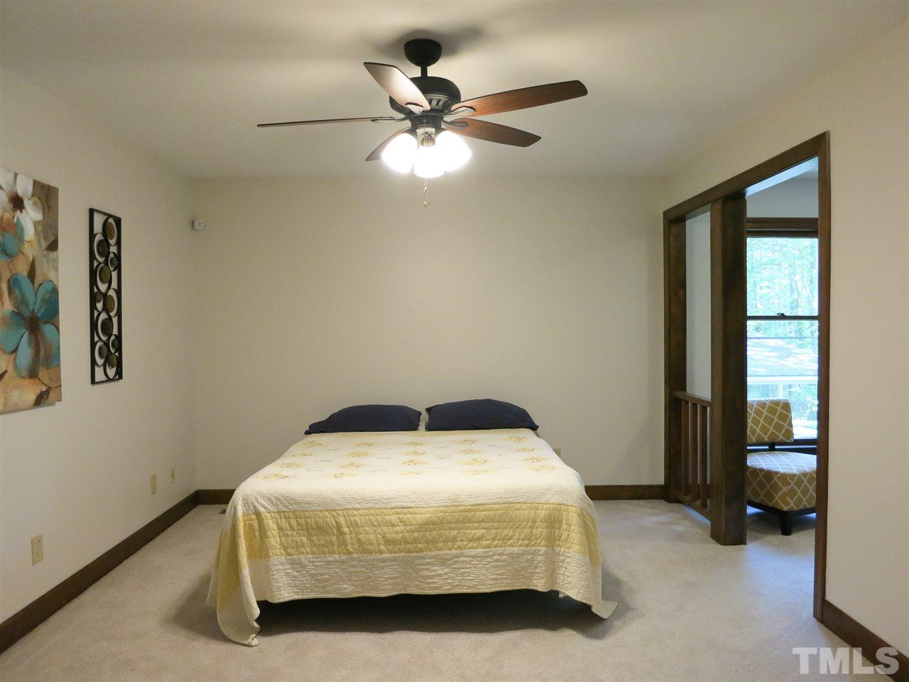 809 Ivanhoe Drive Raleigh, NC 27615 - Photo 18 of 30 Spacious Master Bedroom w/Sitting Area, WIC, NEW neutral carpet, NEW CF & private Bath.
