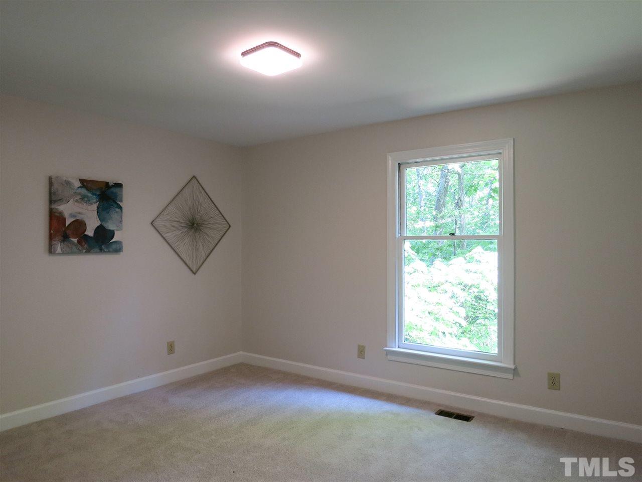 809 Ivanhoe Drive Raleigh, NC 27615 - Photo 22 of 30 There are 2 add'l lg Bedrooms w/NEW neutral carpet & lg closets - this is Bedroom 2.