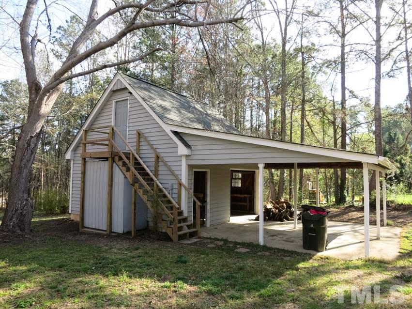 809 Ivanhoe Drive Raleigh, NC 27615 - Photo 27 of 30 Detached 2-car Garage w/234sf storage above & 2-car Carport!