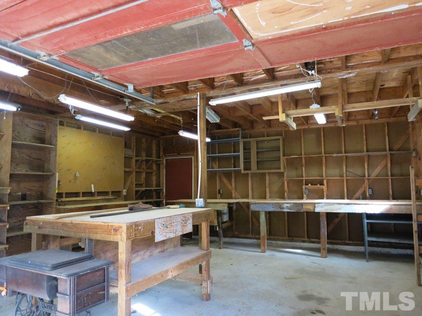 809 Ivanhoe Drive Raleigh, NC 27615 - Photo 28 of 30 Detached 2-car Garage is being used as a Workshop.