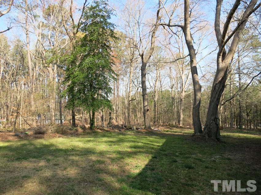 809 Ivanhoe Drive Raleigh, NC 27615 - Photo 29 of 30 Huge backyard shaded by lots of trees.