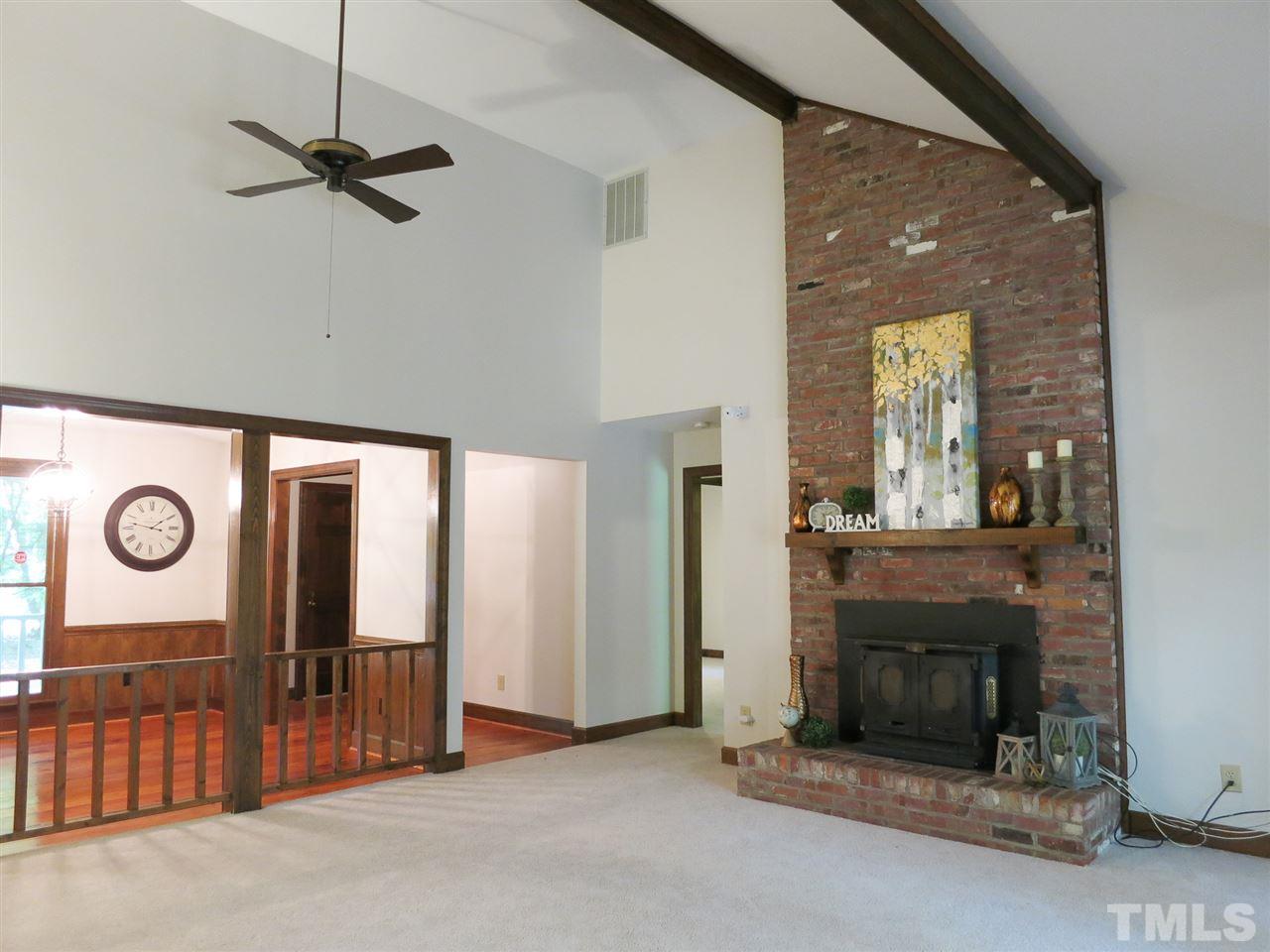 809 Ivanhoe Drive Raleigh, NC 27615 - Photo 5 of 30 Living Rm is open to Dining Rm over railing.