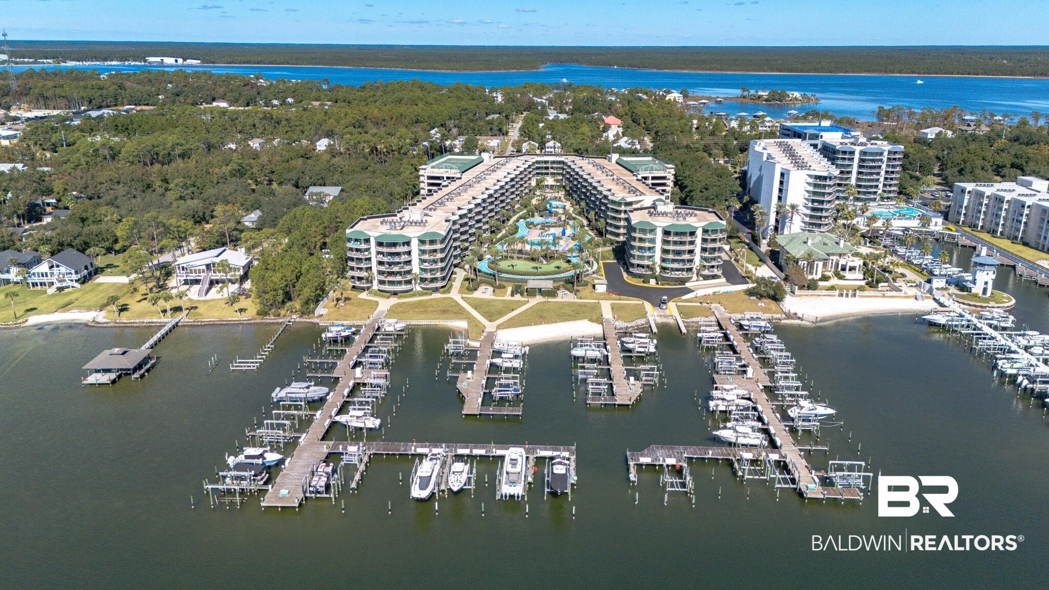 27580 Canal Road, Unit 1526 Orange Beach, AL 36561 - Photo 45 of 49 Aerial view of a nearby body of water and numerous boat docks
