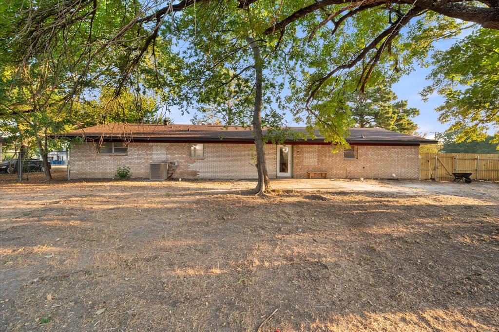 3400 Emhouse Road Corsicana, TX 75110 - Photo 7 of 34 Brick exterior with a brown roof and multiple windows