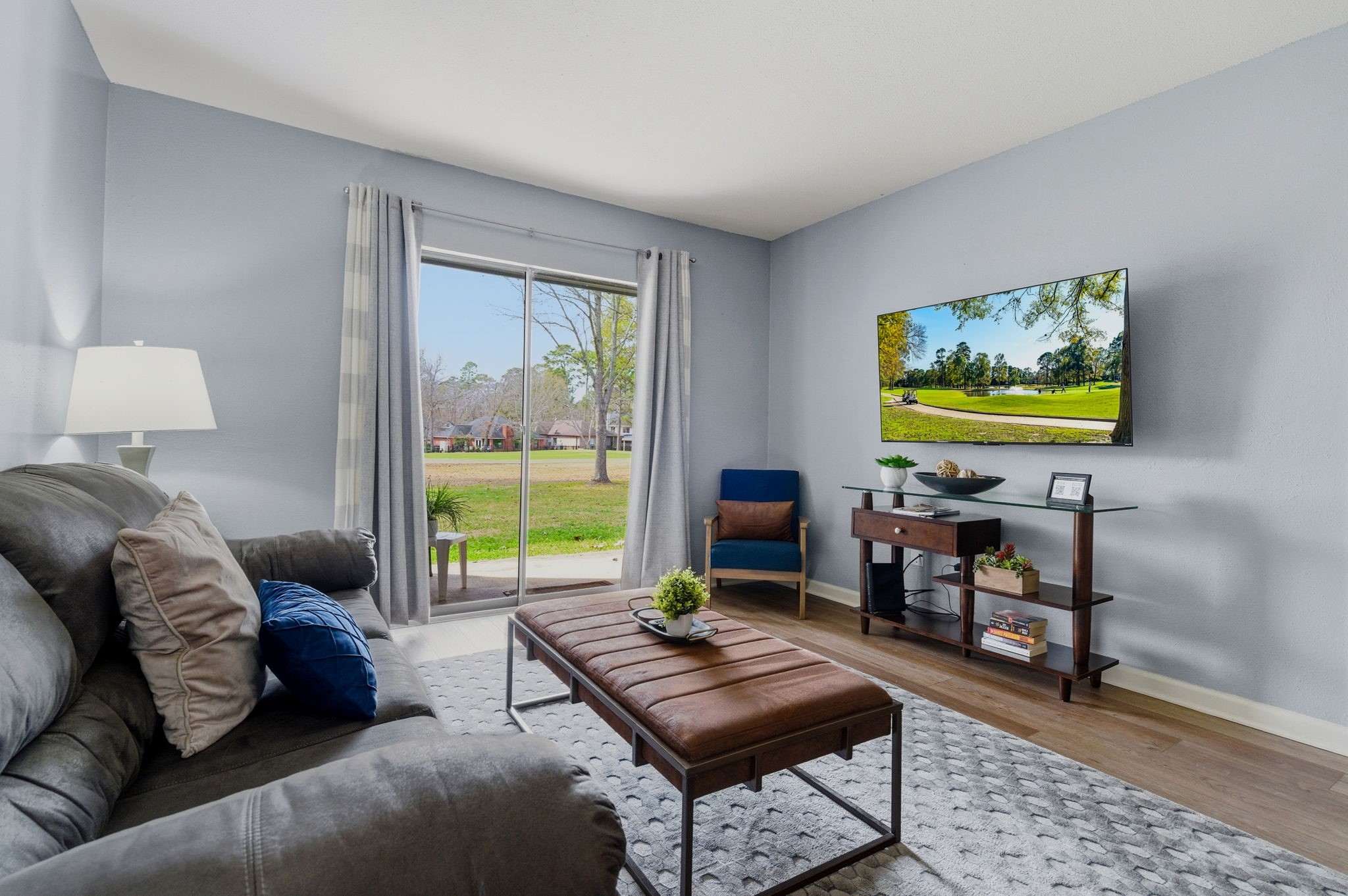 13151 Walden Road, Unit 127 Montgomery, TX 77356 - Photo 3 of 46 a living room with furniture and a window