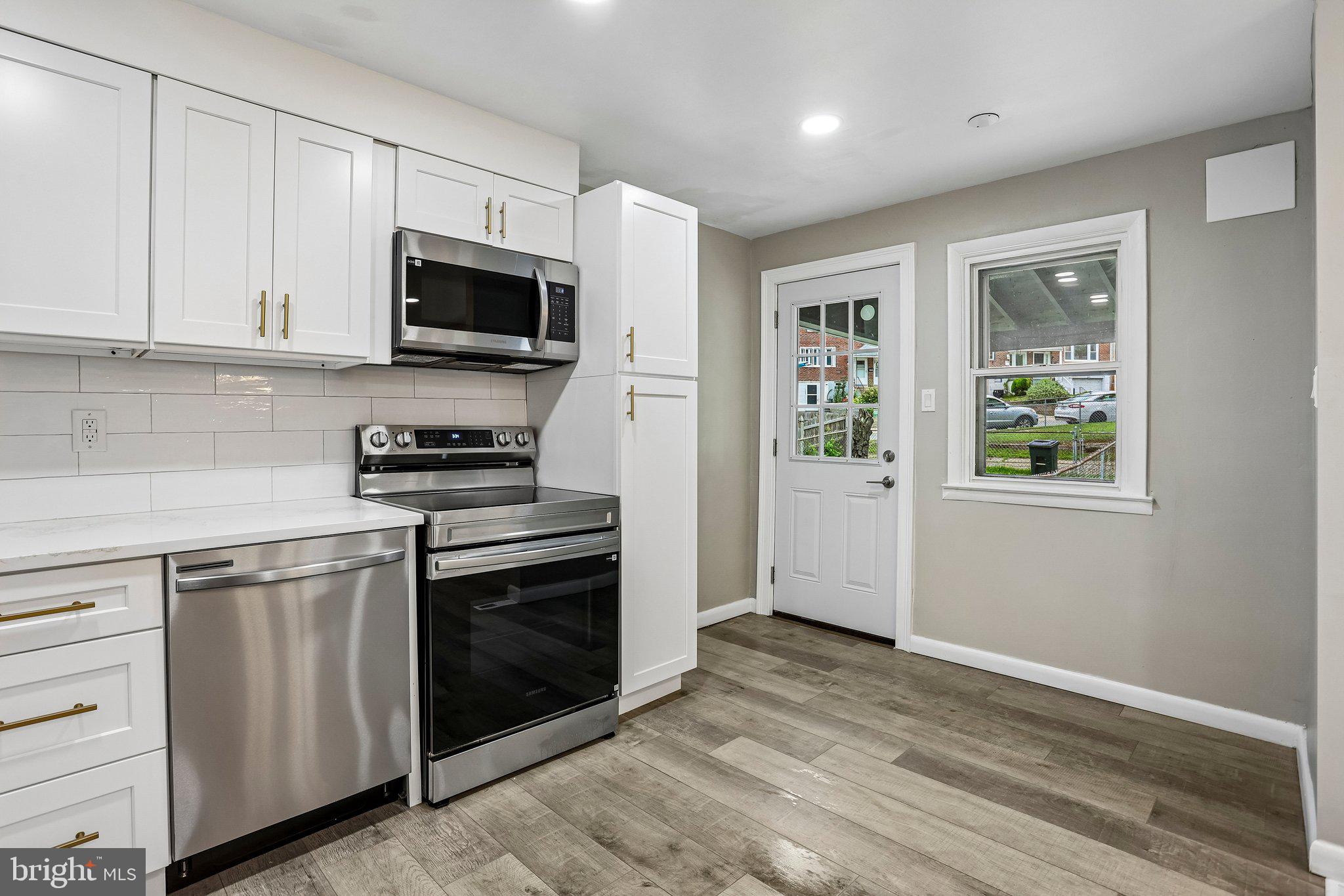 4008 Powell Road Brookhaven, PA 19015 - Photo 11 of 34 Modern kitchen with sleek finishes.