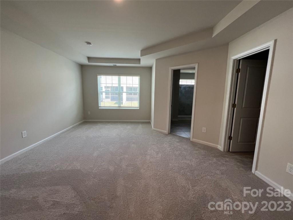 6011 Chelsea Oaks Ridge, Unit 2088 Tega Cay, SC 29708 - Photo 5 of 12 a view of an empty room with a window