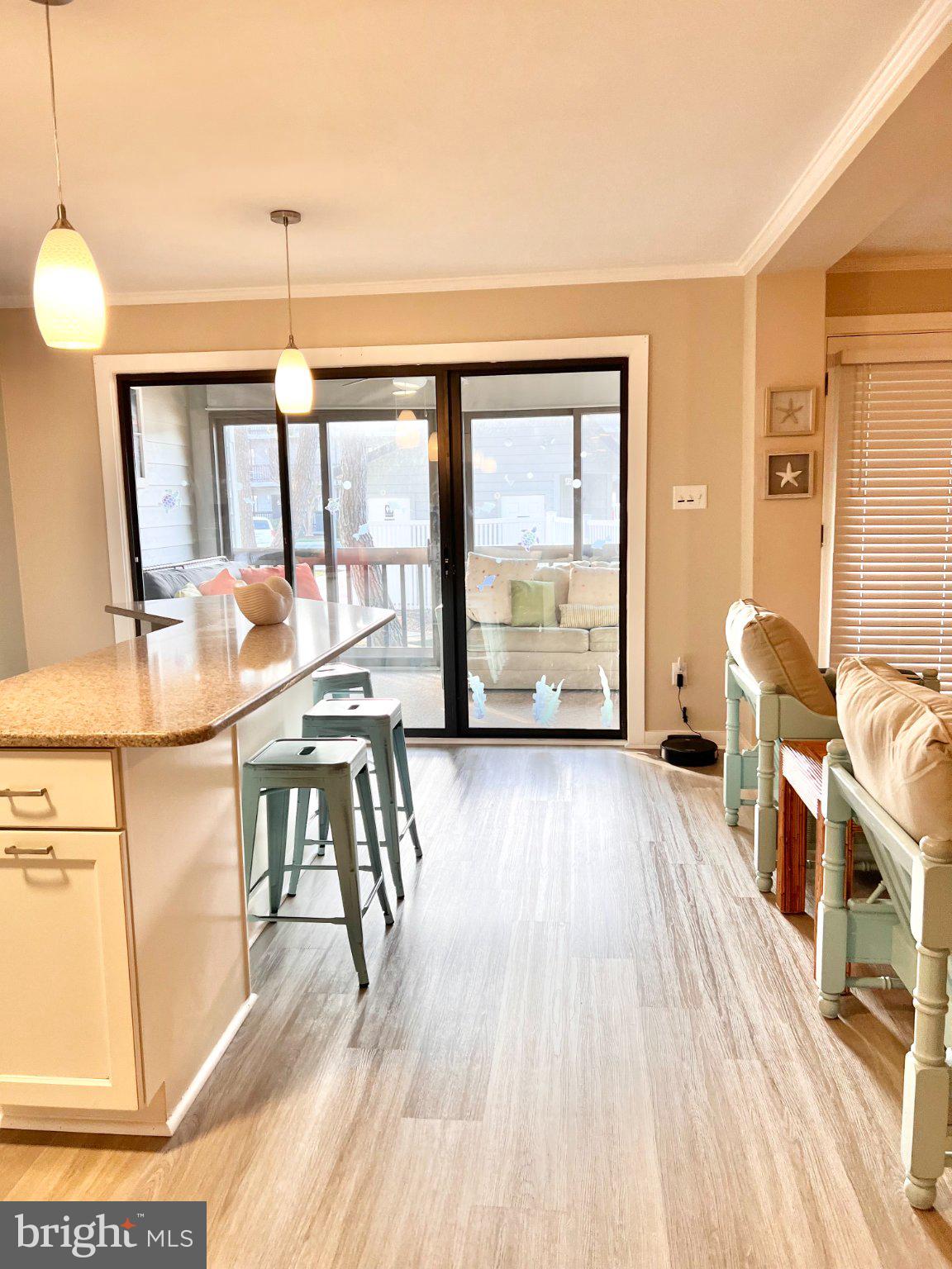 119 Old Landing Road, Unit 102F5 Ocean City, MD 21842 - Photo 9 of 19 Bright and airy kitchen with views.