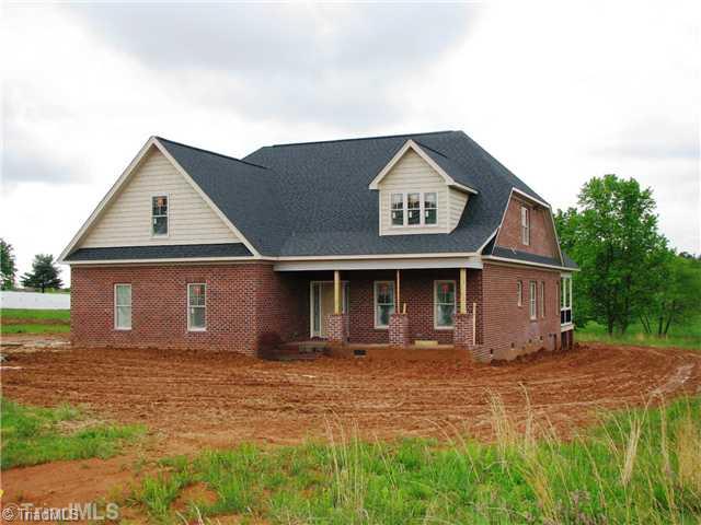 8505 Julina Drive Oak Ridge, NC 27310 - Photo 1 of 6 Exterior Front.