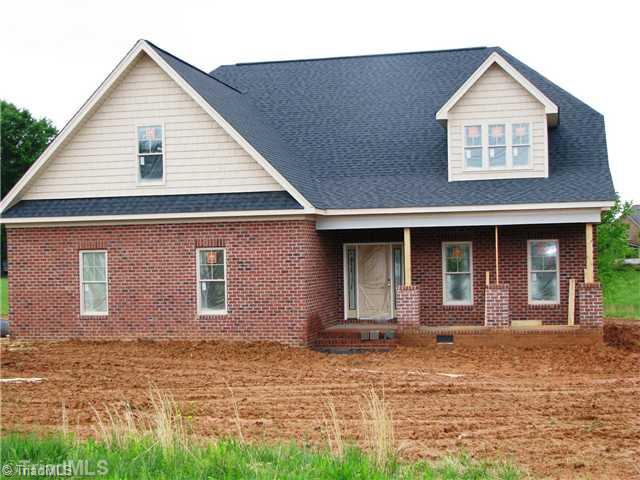 8505 Julina Drive Oak Ridge, NC 27310 - Photo 2 of 6 Exterior Front.