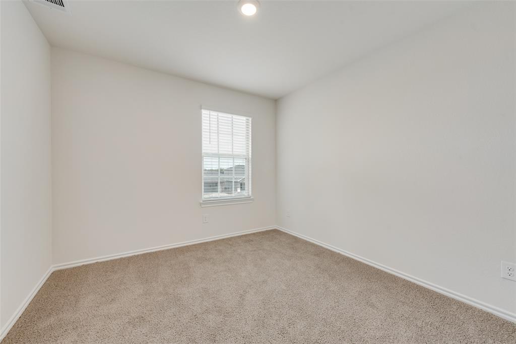 1428 Millstead Rill Drive Caddo Mills, TX 75135 - Photo 19 of 24 an empty room with windows