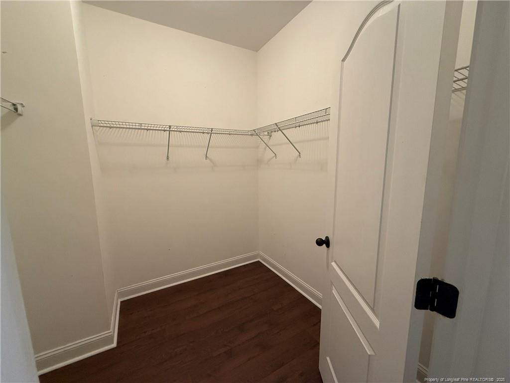 Undisclosed Address Spring Lake, NC 28390 - Photo 13 of 21 a view of small space with racks on the wall