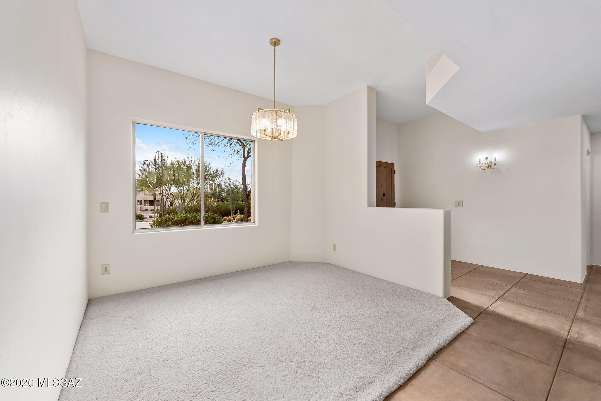 3655 North Harrison Road Tucson, AZ 85749 - Photo 12 of 51 a view of an empty room with a window