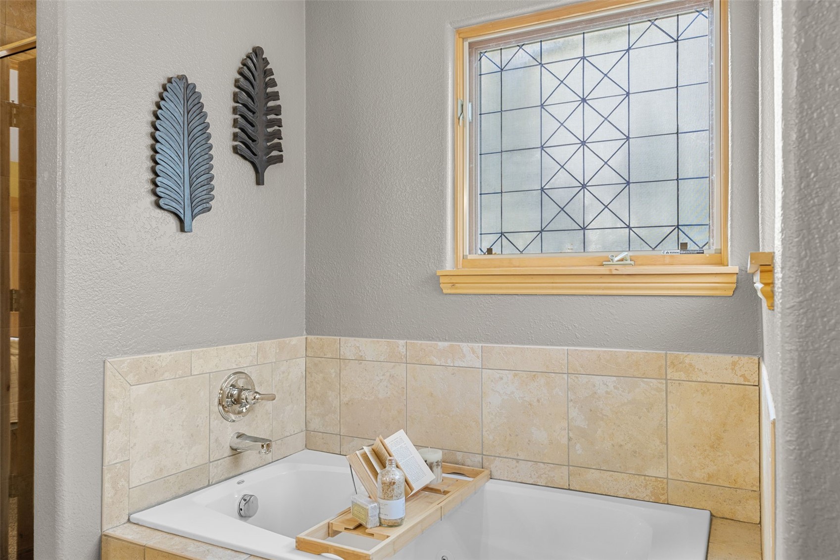 91795 Ryan Gulch Road Silverthorne, CO 80498 - Photo 27 of 50 a bathroom with a bathtub and shower
