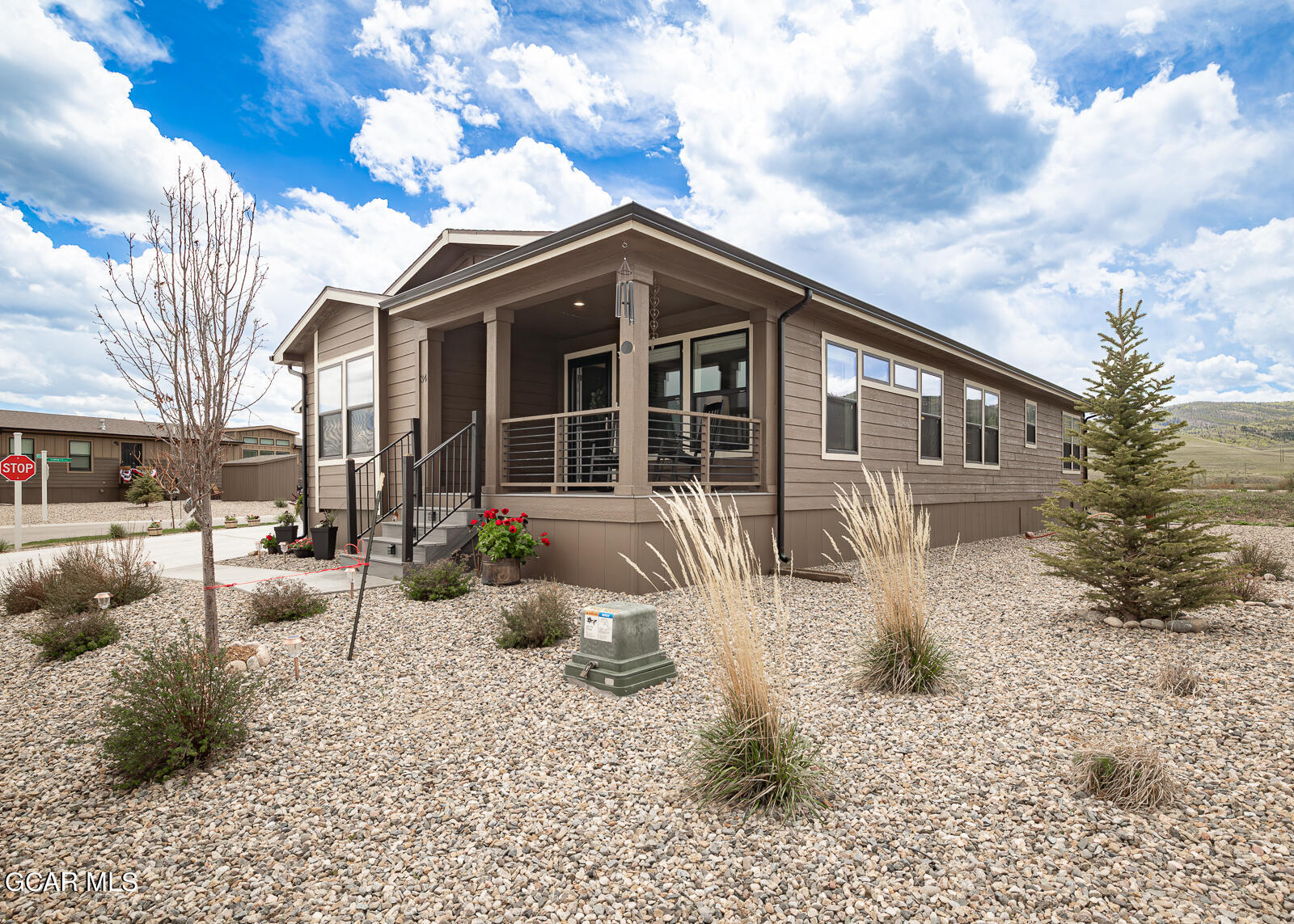 551 Summit Trail, Unit 34 Granby, CO 80446 - Photo 22 of 35 a front view of a house with patio