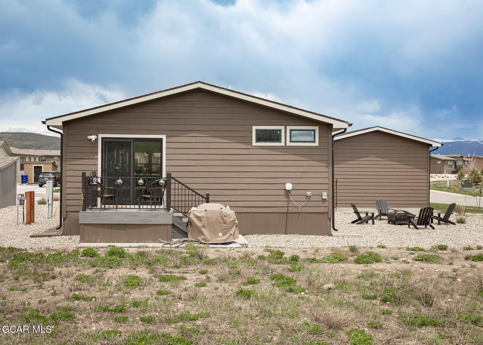 551 Summit Trail, Unit 34 Granby, CO 80446 - Photo 28 of 35 a house view with a outdoor space